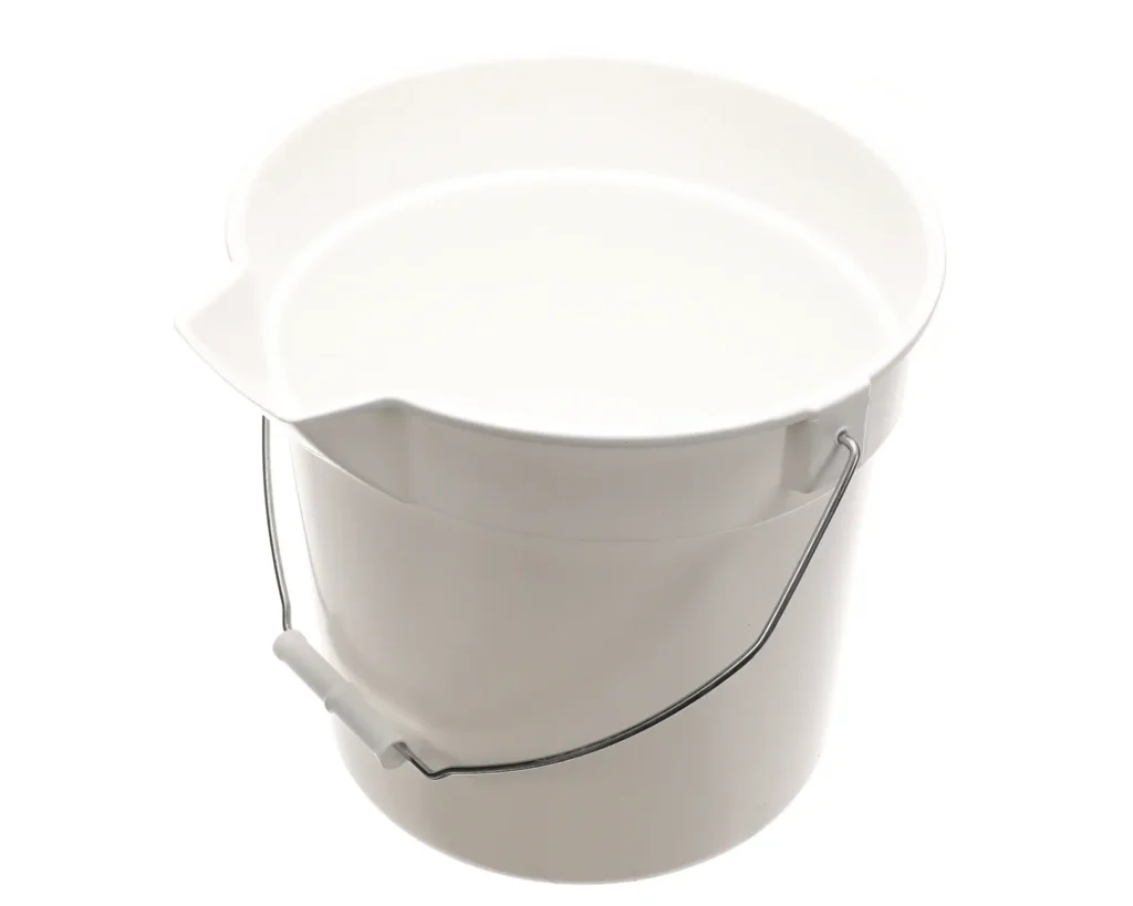 a white bucket with a handle