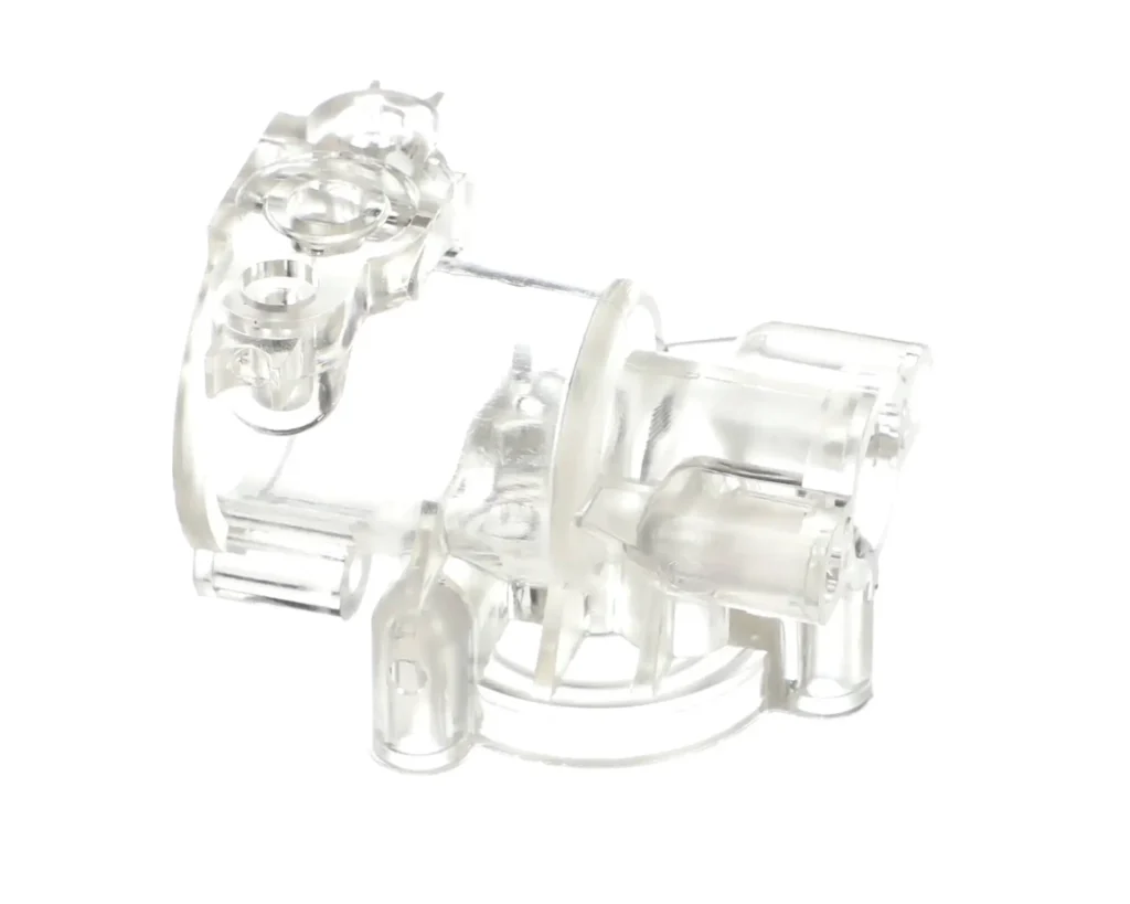 a clear plastic object with holes