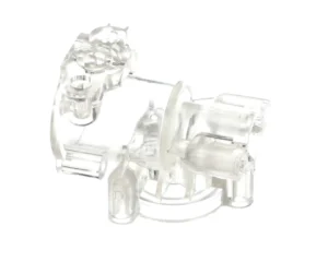 a clear plastic object with holes