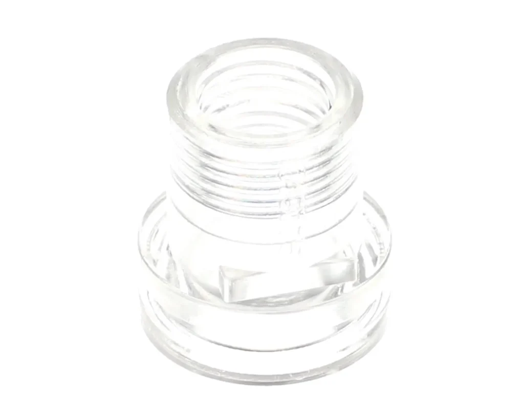 a clear plastic tube with a nut