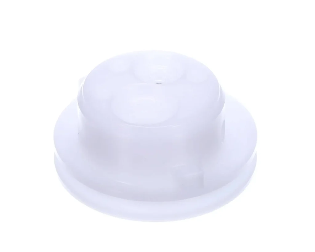 a white plastic object with a hole