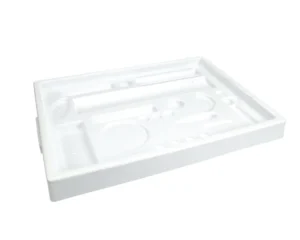 a white plastic tray with different tools