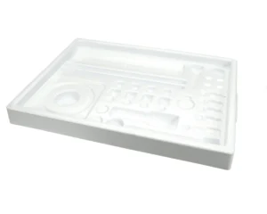 a white plastic object with different shapes