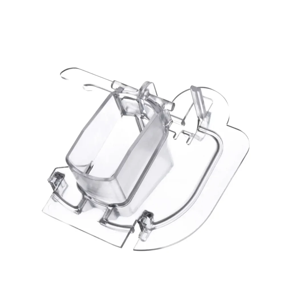 a clear plastic object with a handle