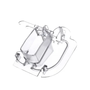 a clear plastic object with a handle