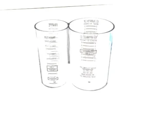 a close up of a measuring cup
