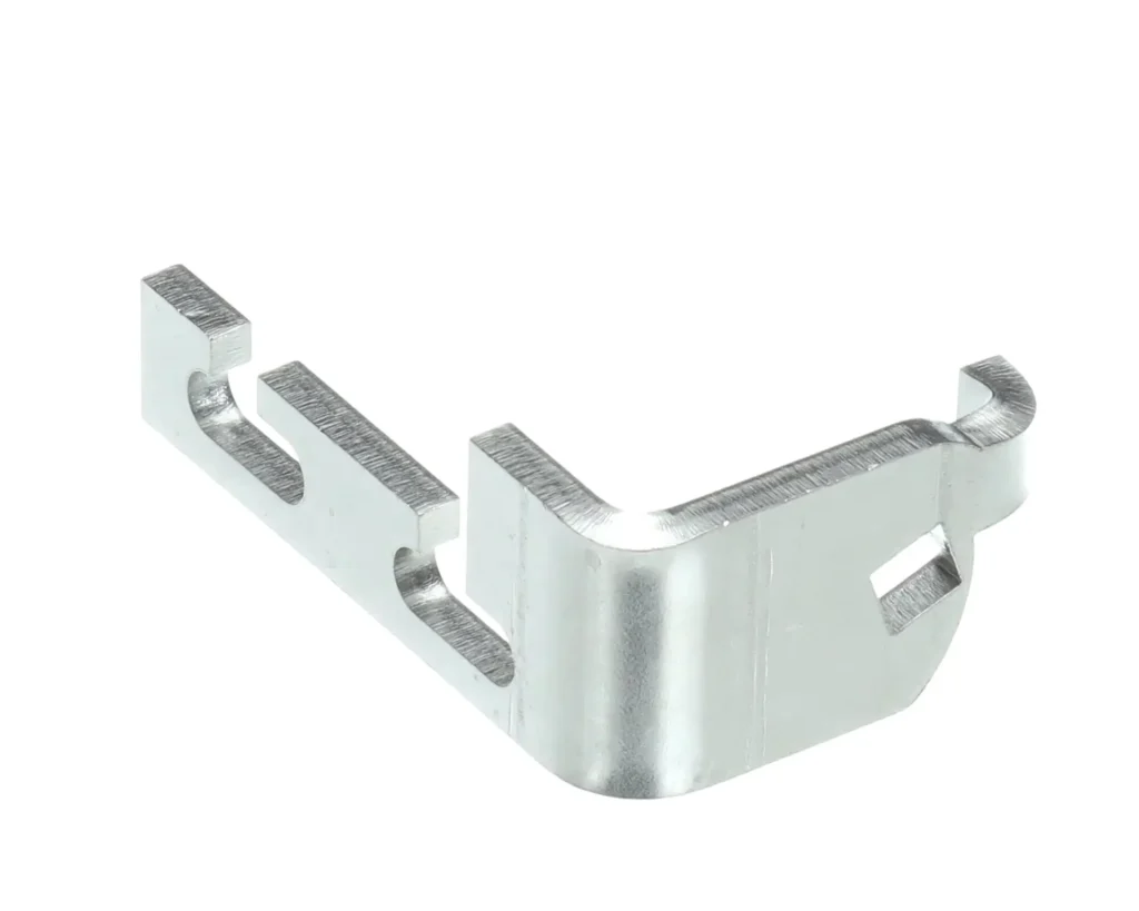a metal corner with holes