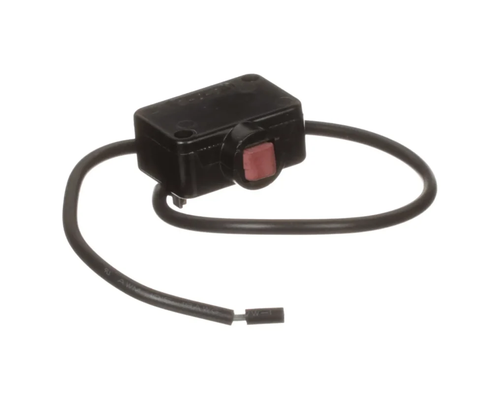 a black box with a red button