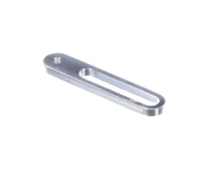a silver object with a hole