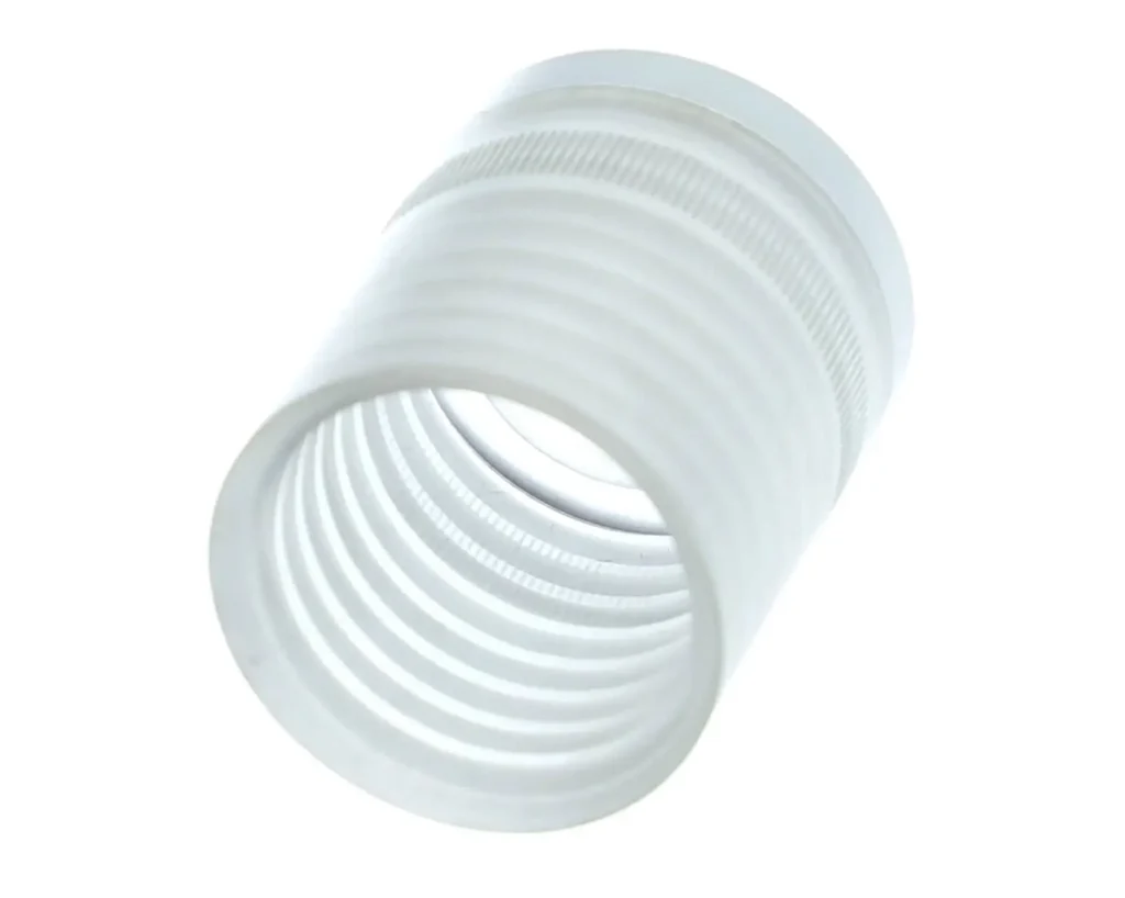 a white plastic tube with a hole