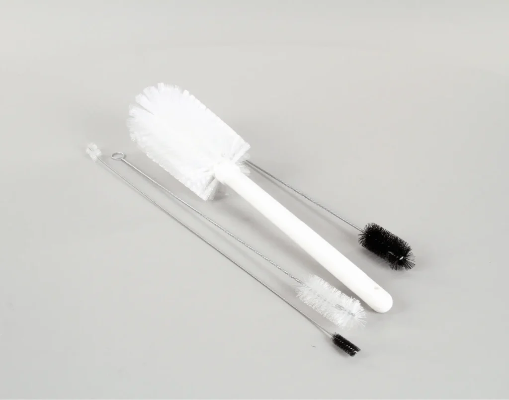 a white brush with black brushes