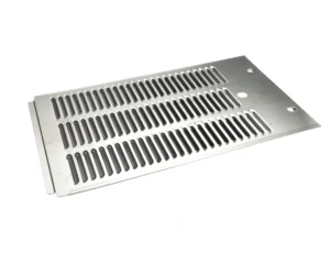 a metal grate with holes