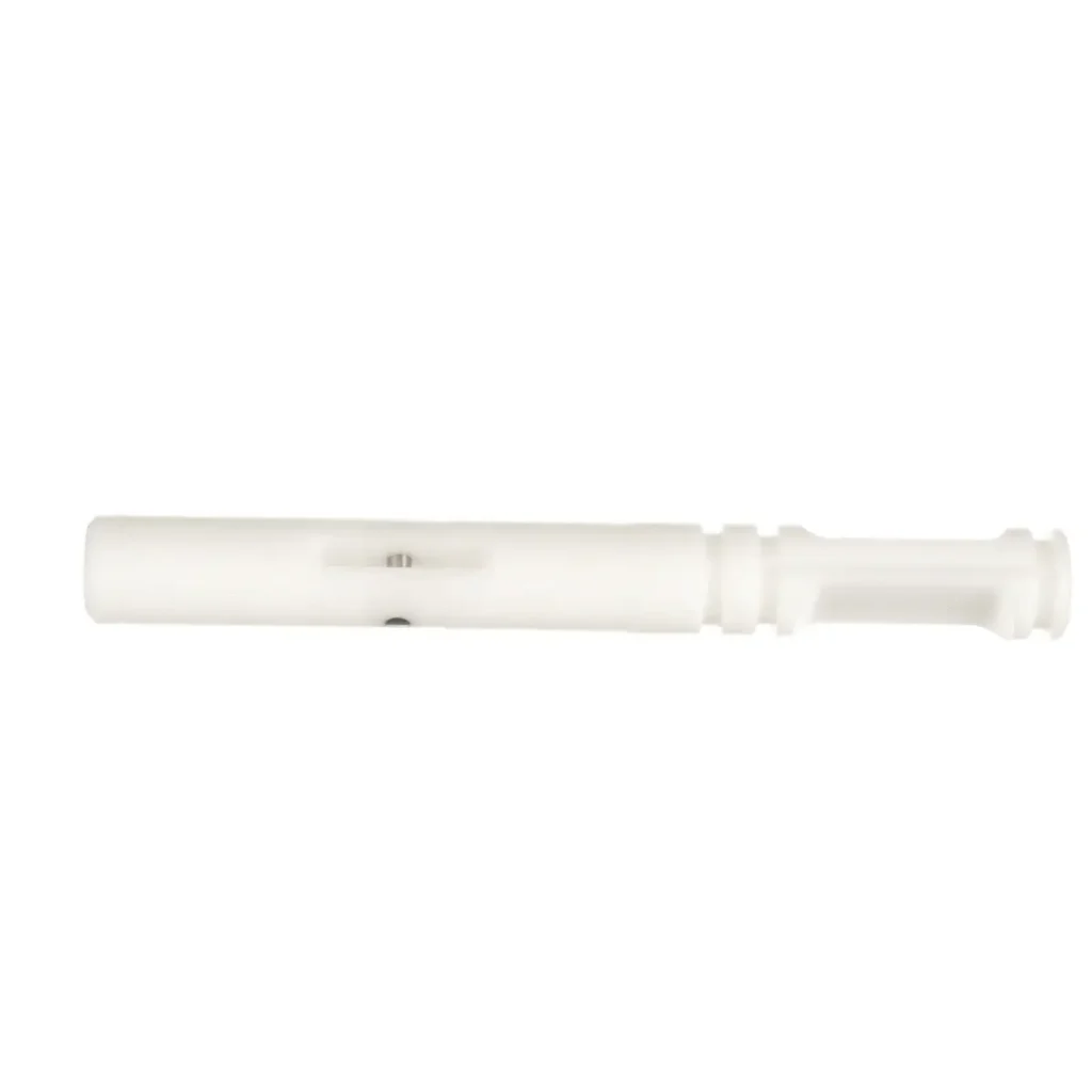 a white plastic object with a metal needle