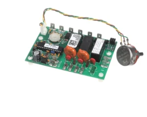 a green circuit board with wires and a round object