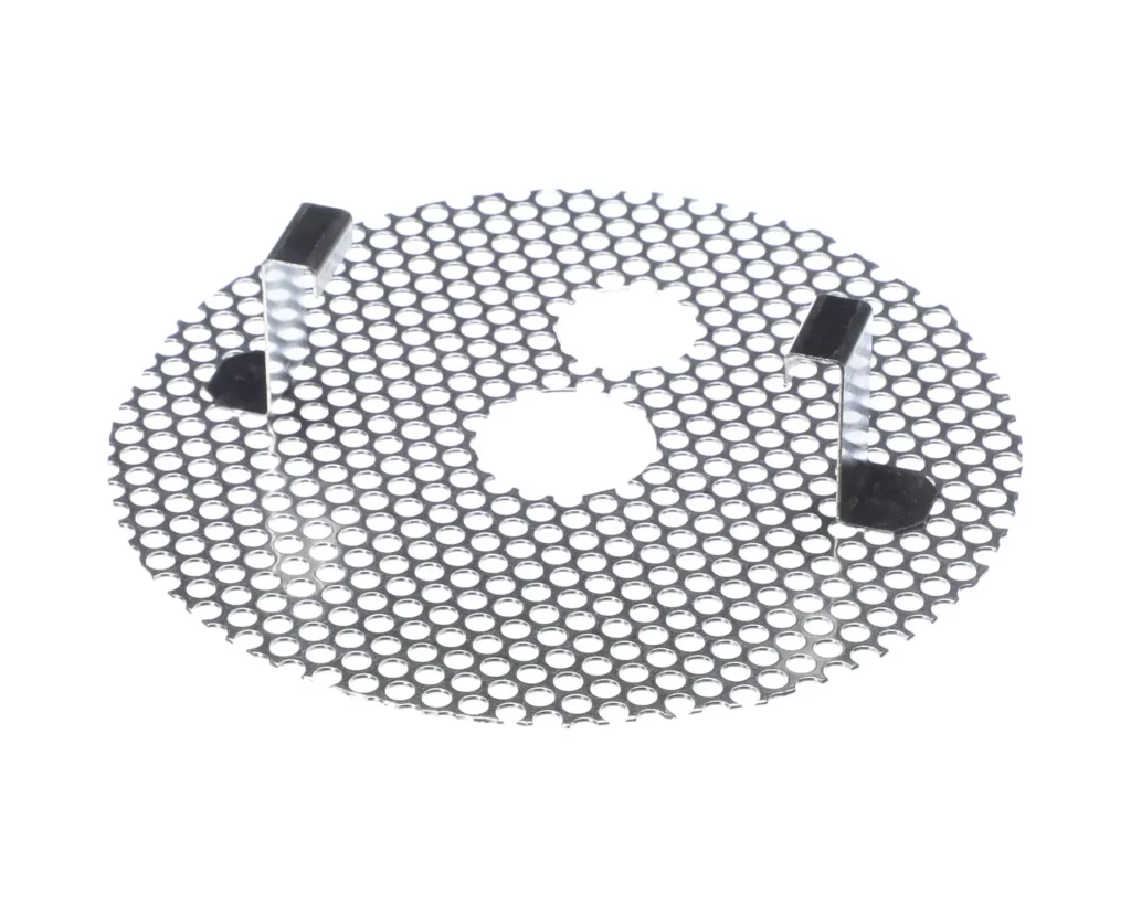 a metal grid with holes