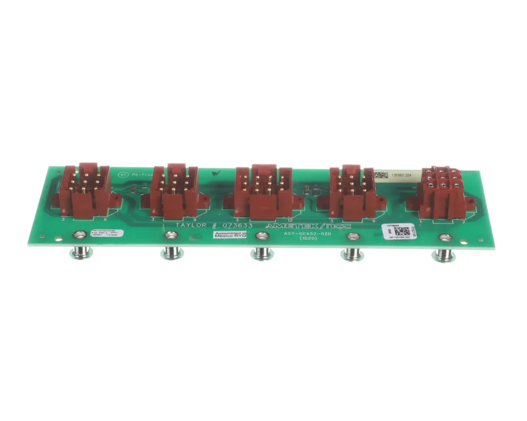 a green circuit board with red buttons