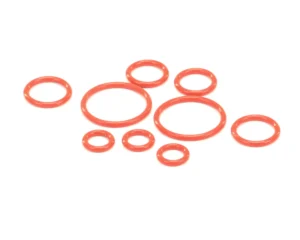 a group of red round objects