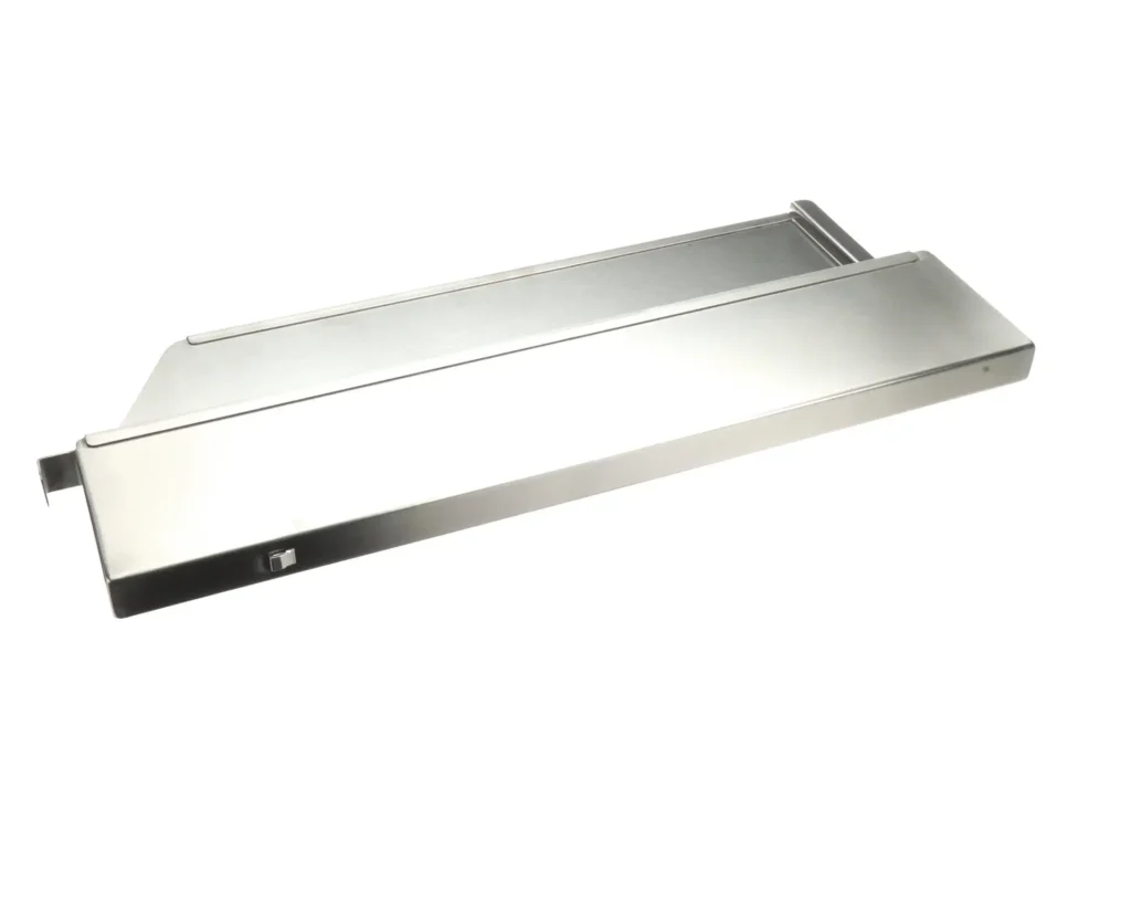 a silver metal object with a white background