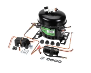 a black machine with copper pipes and a green label