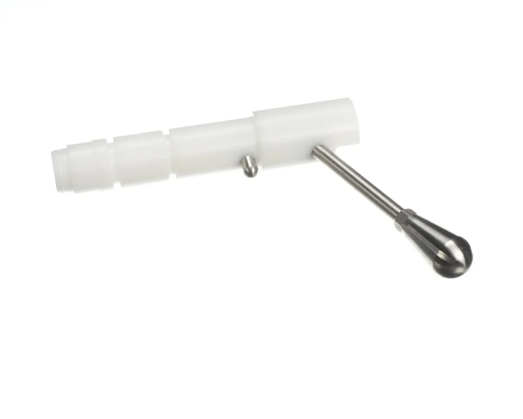 a white plastic tube with a metal handle