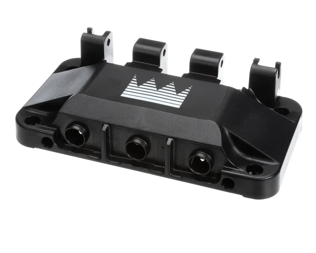 a black plastic device with holes