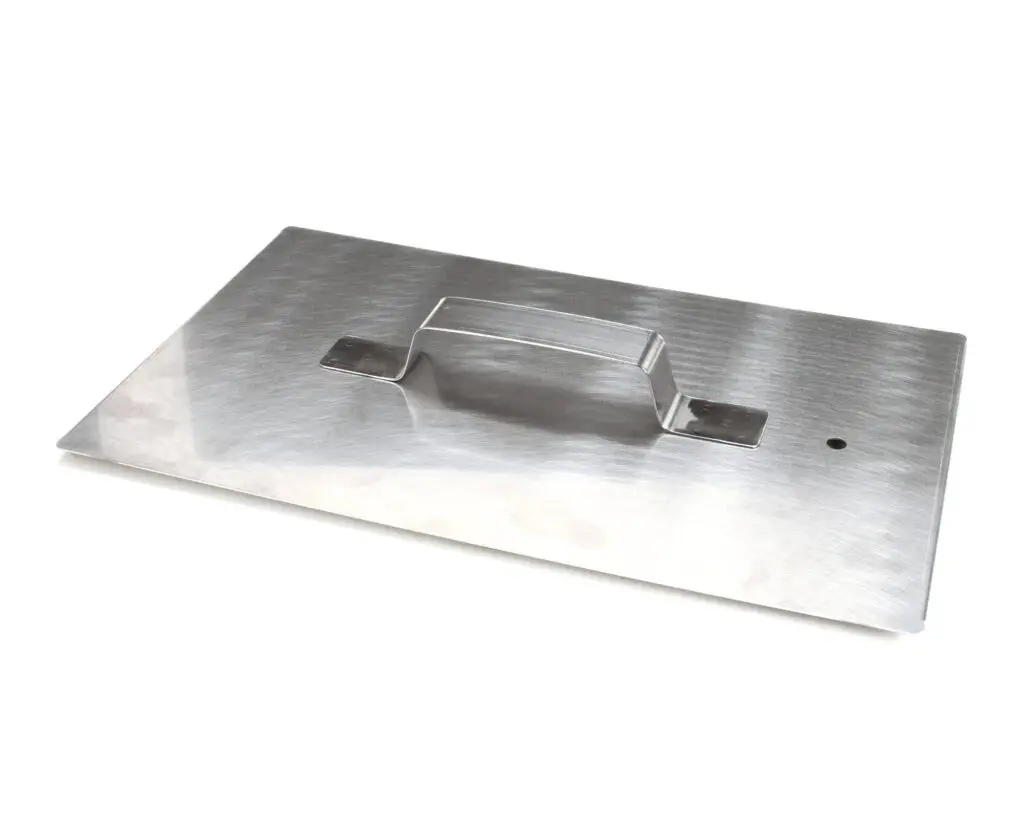 a metal rectangular object with a handle