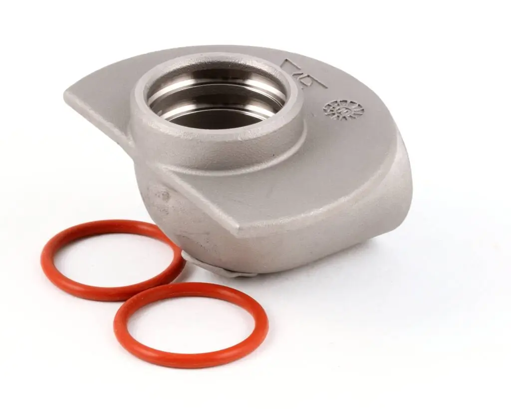a silver object with red rings