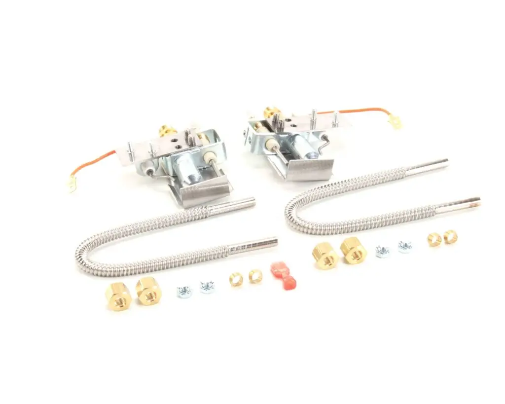 a group of metal parts with wires and screws