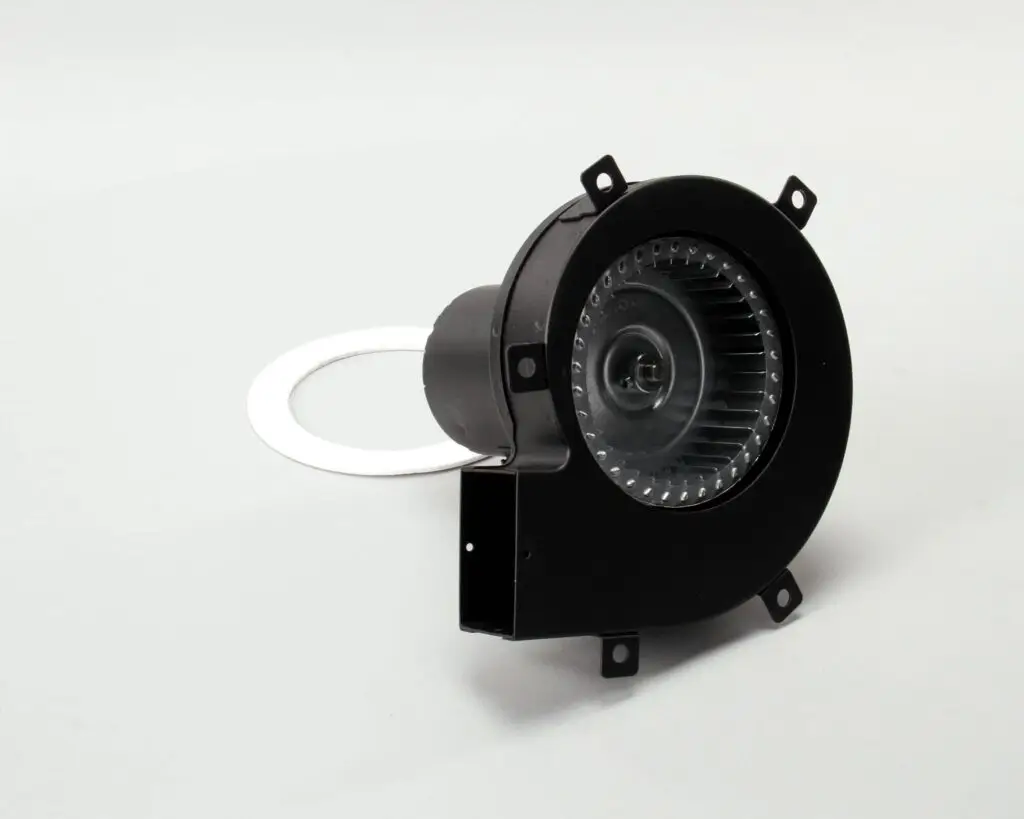 a black circular object with a white circle