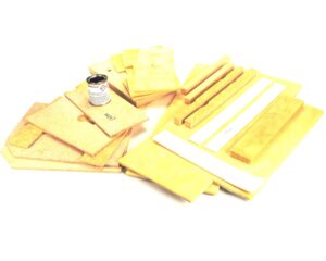 a group of pieces of yellow material