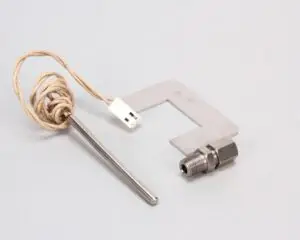 a metal piece with a cord attached to it