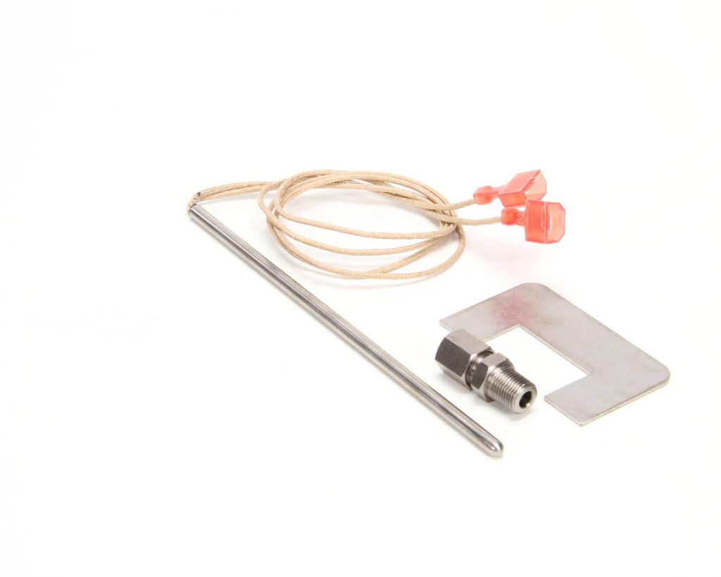 a metal piece with a string and a piece of metal
