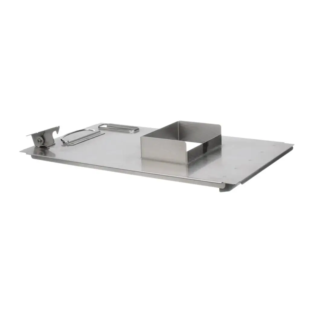 a metal tray with a clip on it