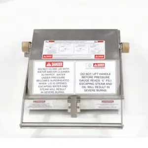 a metal box with warning labels