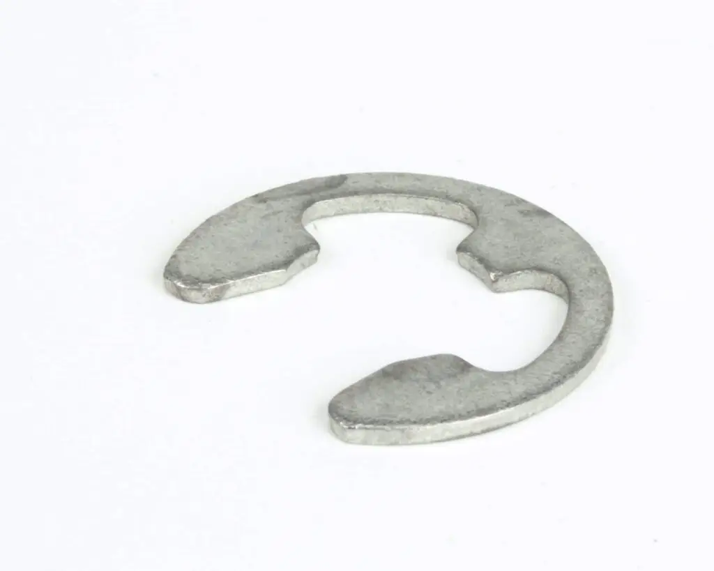 a silver circle with a curved design