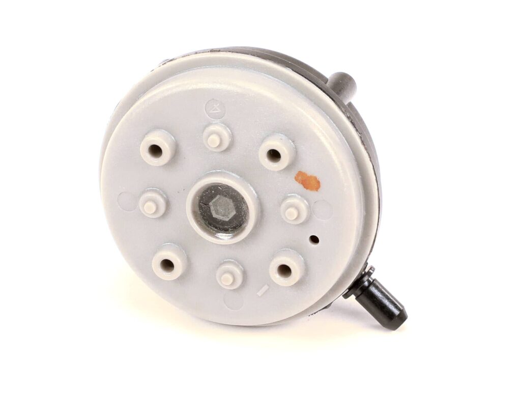 a grey circular object with white circles