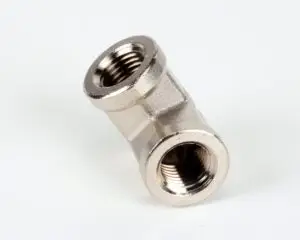 a silver metal piece with nozzles