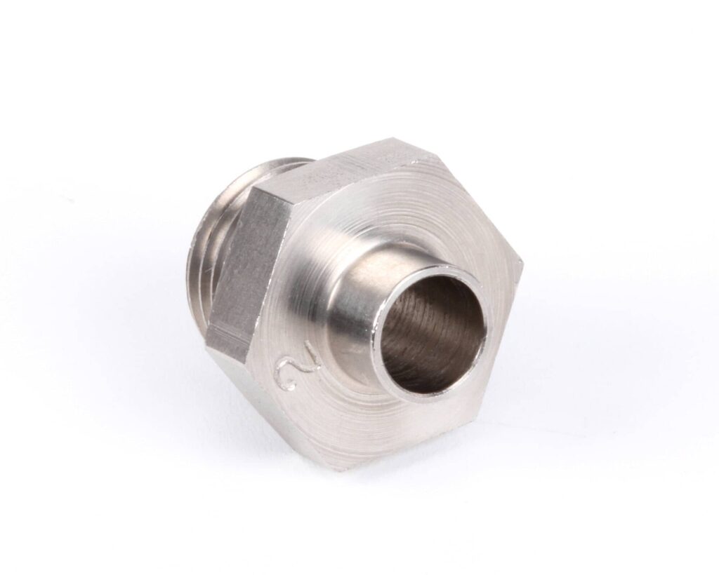 a silver metal nut with a hole