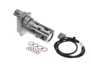 a metal cylinder with a wire and gaskets