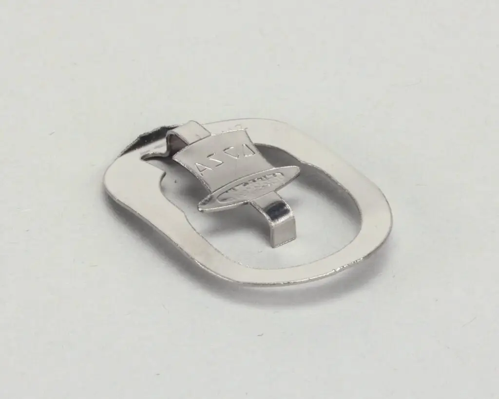 a silver object with a clip