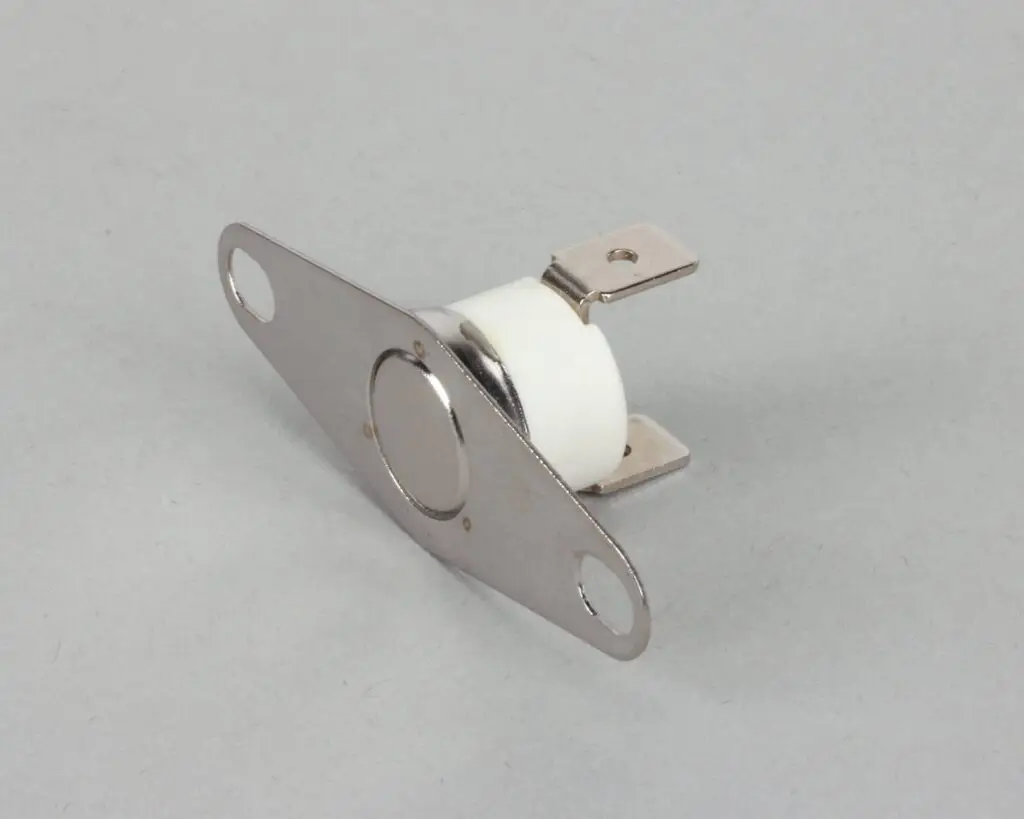 a metal and white device