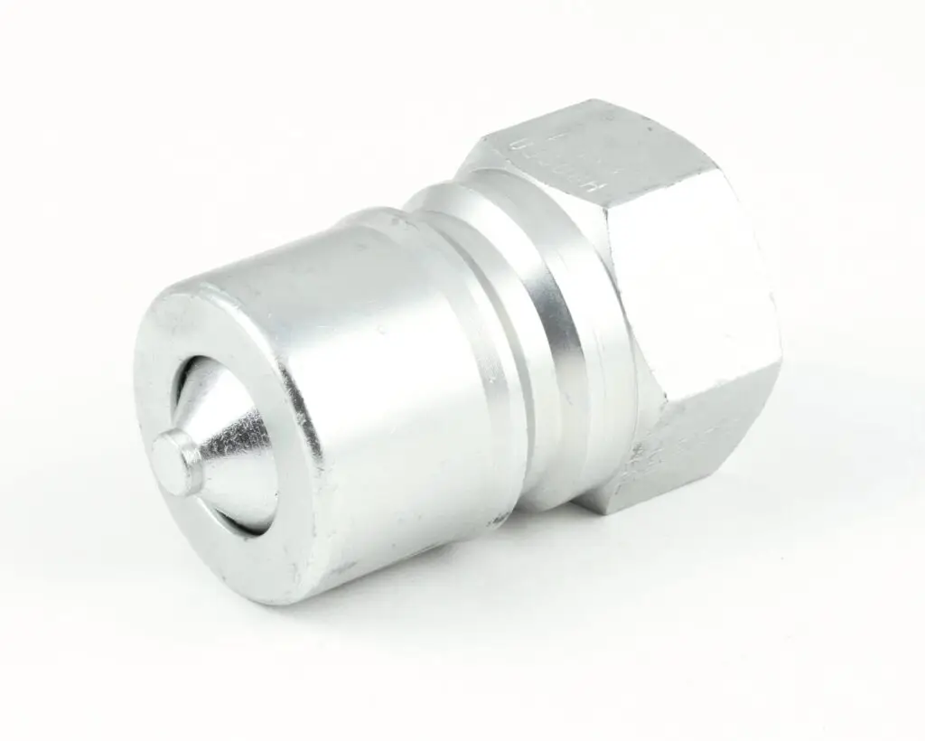 a silver metal piece with a round top