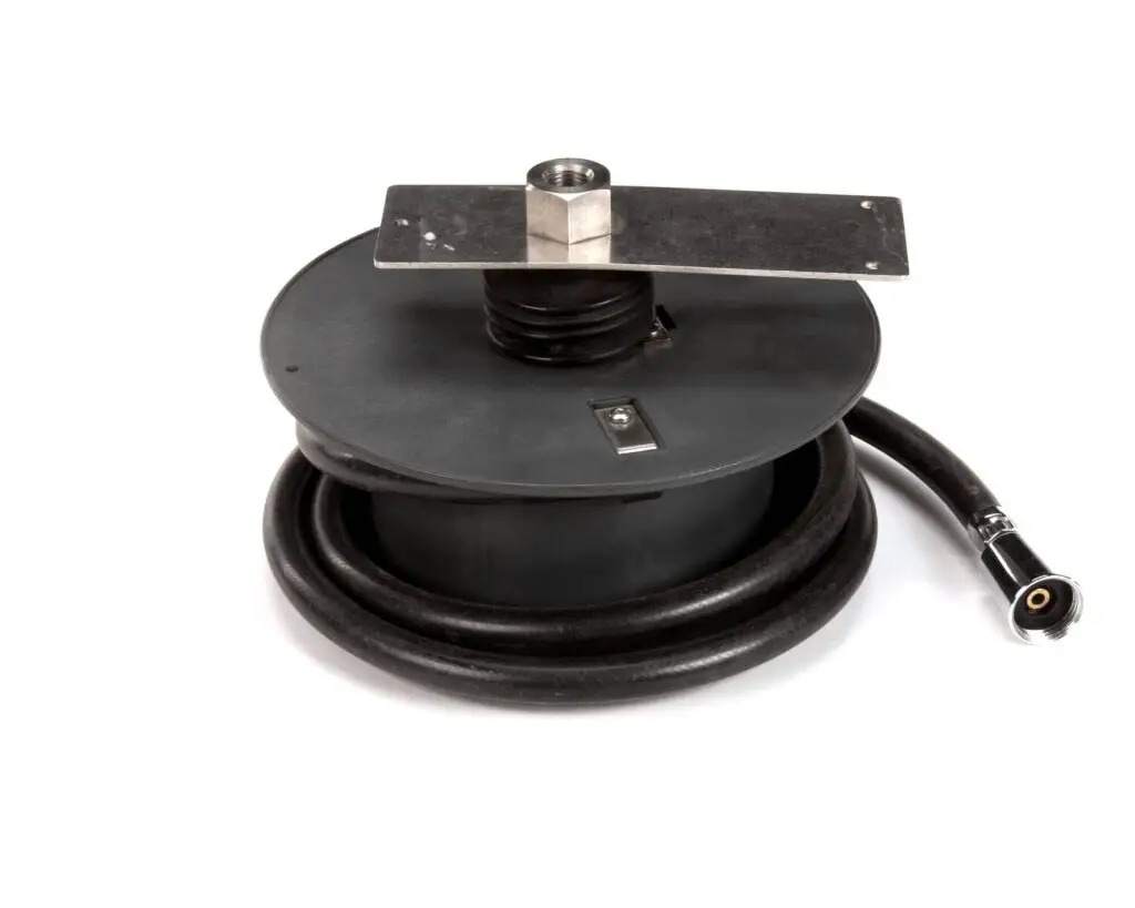 a black hose with a metal plate