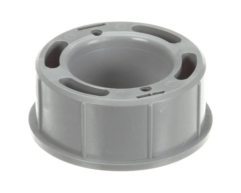 a grey plastic object with holes