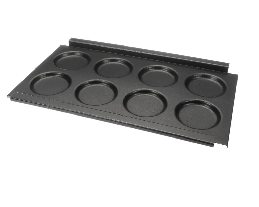 a black pan with holes in it