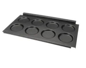 a black pan with holes in it