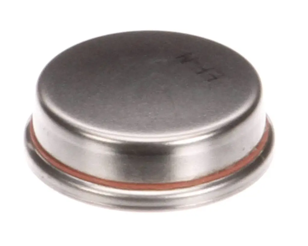 a round silver object with a red band