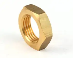 a gold nut with a nut in the middle