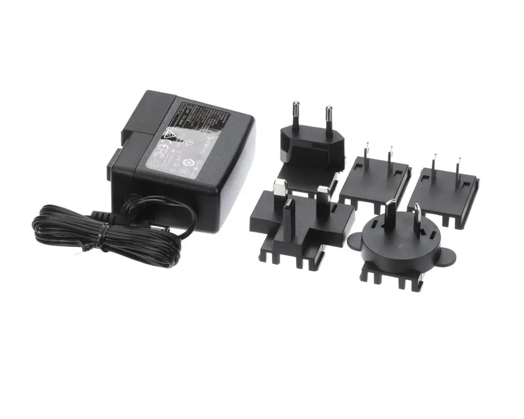 a black electrical device with a wire